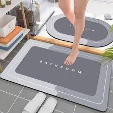 ALFOMBRA DE BAÑO SUPER ABSORBENTE ROSADA.